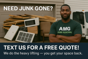 AMG Junk Removal team member standing in front of junk piles with a promotional banner.